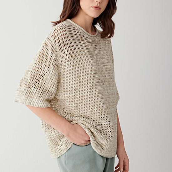 Video showing walking movement, highlighting open knit construction, breathability and soft drape