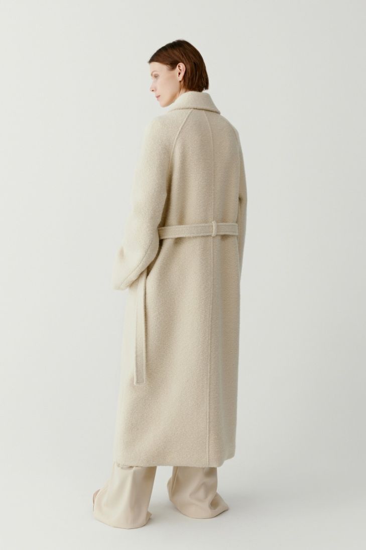 Long belted bouclé wool coat