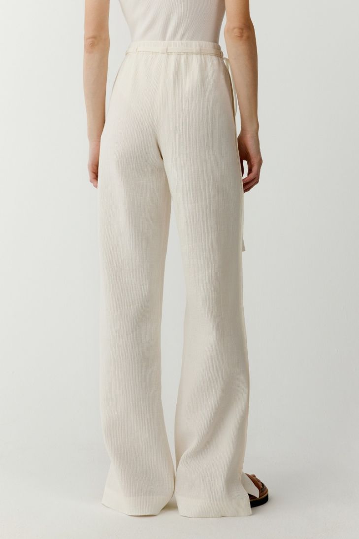 Pleated cotton trousers with elasticated waist