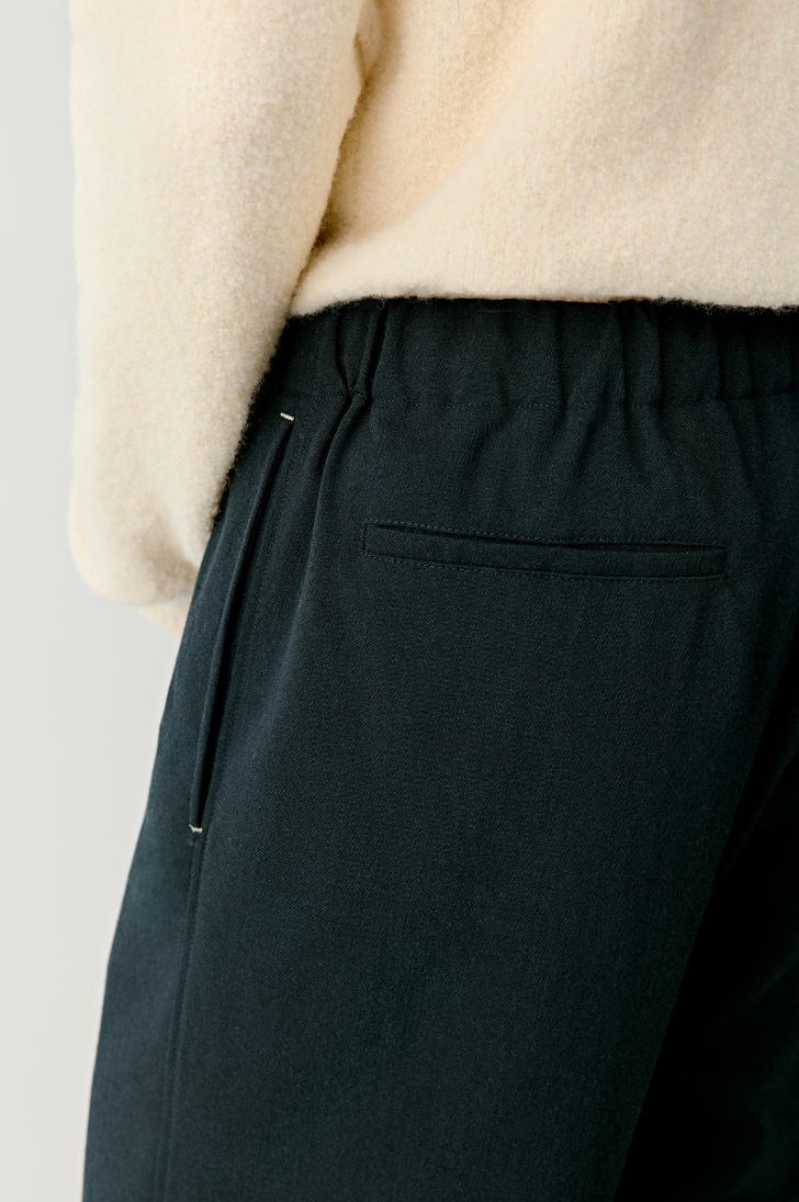 Tapered stretch wool trousers