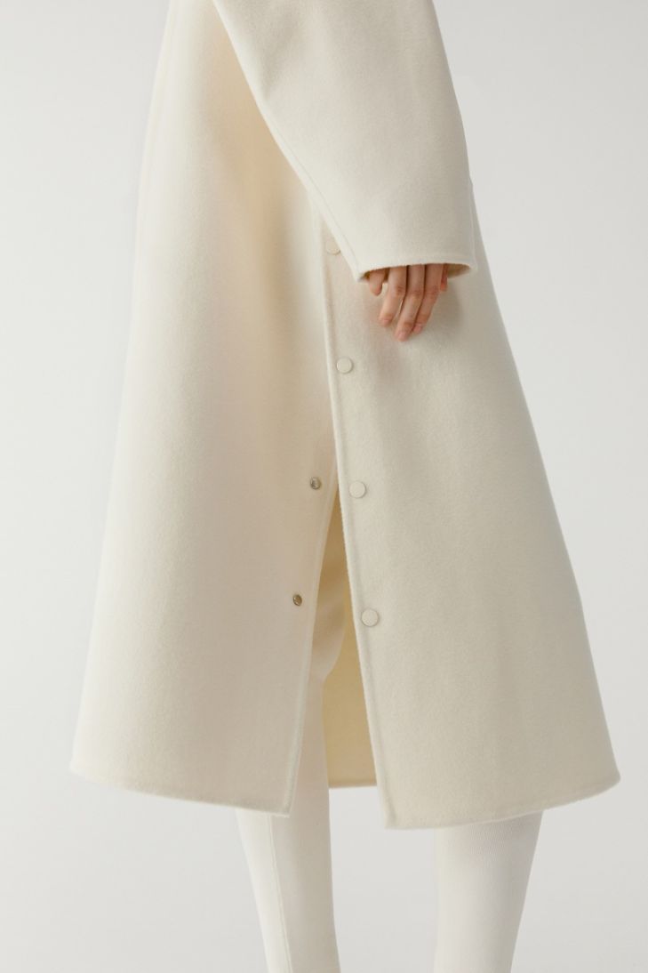 Manteau long à capuche en laine double face