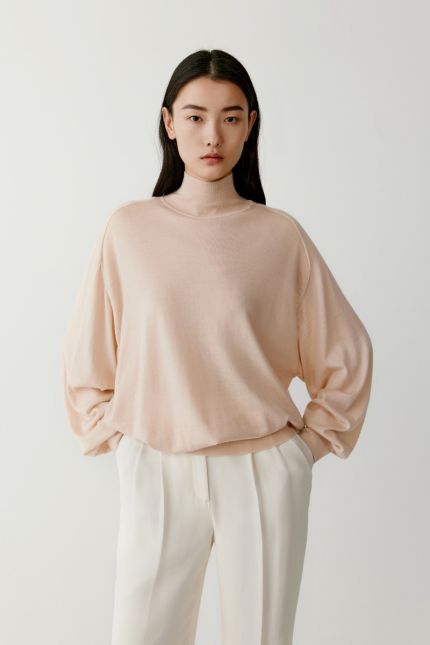 Loose fit merino wool jumper with high collar