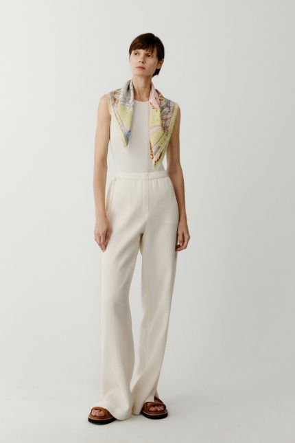 Pleated cotton trousers with elasticated waist