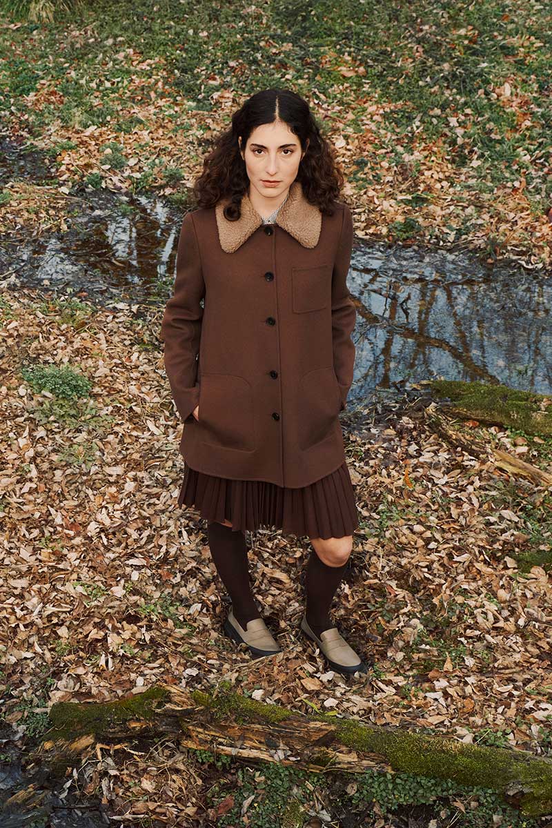 woman standing in forest