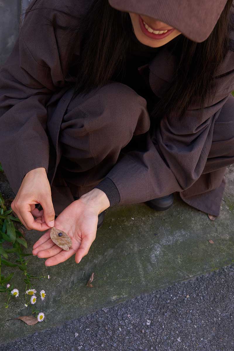 woman sitting in forest