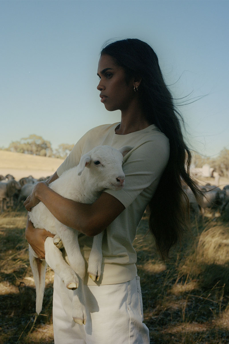 woman holding lamb